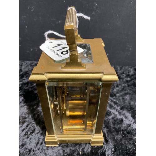 118 - SMALL BRASS CARRIAGE CLOCK WITH BEVELLED GLASS MADE BY WHYTTOCK AND SONS - HEIGHT 6”