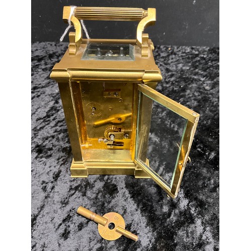 118 - SMALL BRASS CARRIAGE CLOCK WITH BEVELLED GLASS MADE BY WHYTTOCK AND SONS - HEIGHT 6”