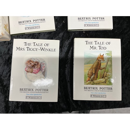 119 - COLLECTION OF BEATRIX POTTER CHILDRENS BOOKS WITH ORIGINAL SLEEVES IN ORIGINAL BOXES AND A PELHAM ST... 