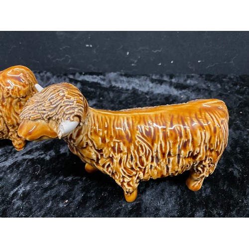 133 - COLLECTION OF CERAMIC ANIMALS TO INCLUDE THREE HIGHLAND CATTLE SIGNED TO BASE AND TWO CERAMIC SHEEP