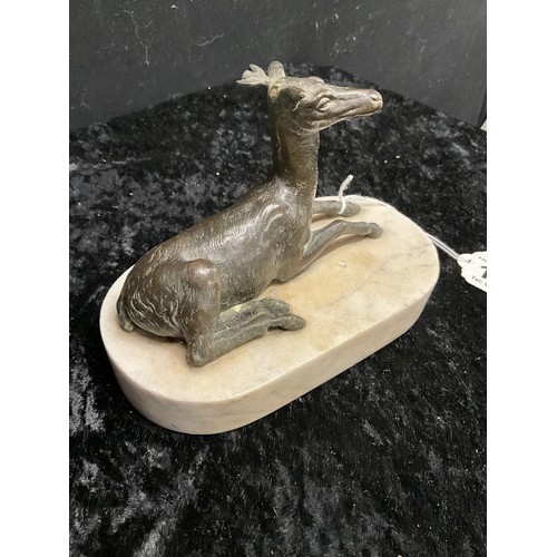 138 - BRONZE DEER ON WHITE  MARBLE BASE NO DISTINCTIVE MAKERS MARK DAMAGED TO ONE ANTLER