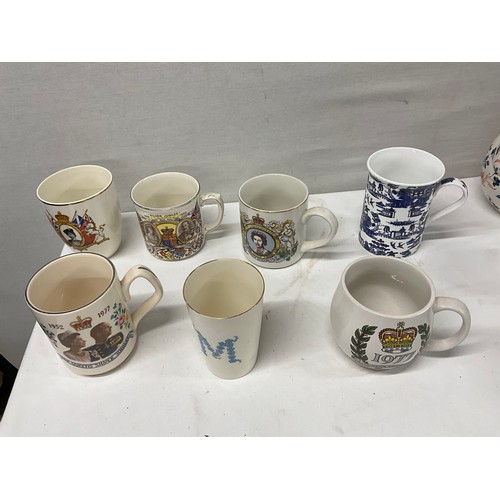 155 - COLLECTION OF MUGS TO INCLUDE LARGE QUANTITY OF COMMERATIVE JUGS BUTTER DISH BOWLS TEA CUPS SAUCERS ... 