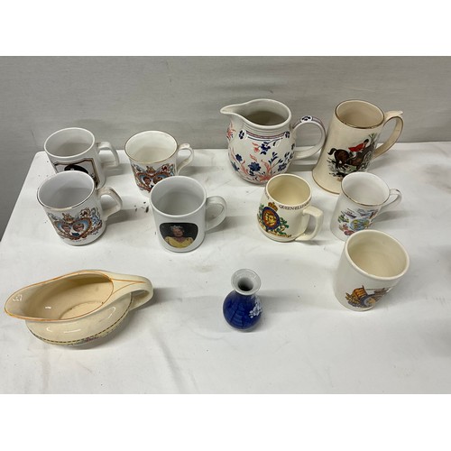 155 - COLLECTION OF MUGS TO INCLUDE LARGE QUANTITY OF COMMERATIVE JUGS BUTTER DISH BOWLS TEA CUPS SAUCERS ... 