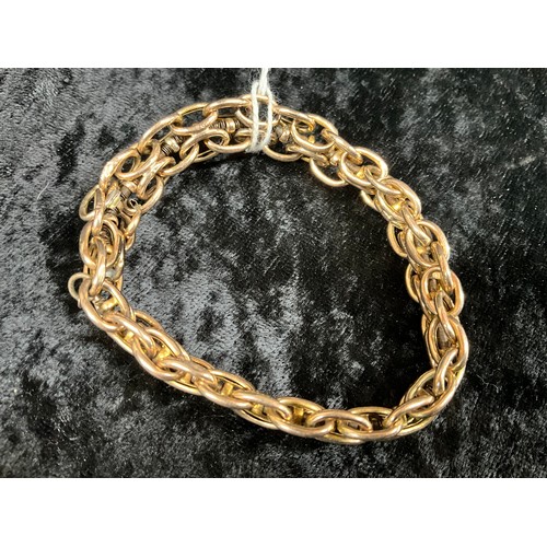 136 - VINTAGE 9 CT (TESTED) GOLD EXPANDING BRACELET WITH STEEL SPRINGS AND SOME OLD REPAIRS 12.5G GOLD WEI... 