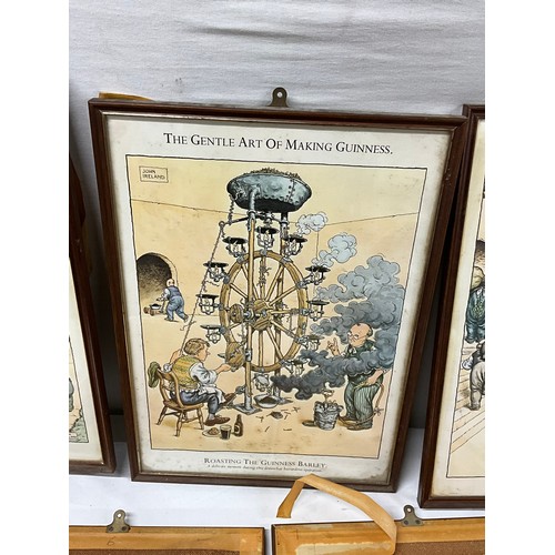 183 - NINE FRAMED PRINTS OF THE ART OF MAKING GUINESS BY JOHN IRELAND (CARTOON) - 18” x 13”