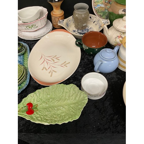 216 - TWO BOXES OF ASSORTED KITCHENWARE TO INCLUDE TEAPOTS MUGS CUPS DISHES PLATES JARS ETC