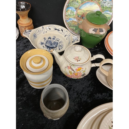 216 - TWO BOXES OF ASSORTED KITCHENWARE TO INCLUDE TEAPOTS MUGS CUPS DISHES PLATES JARS ETC