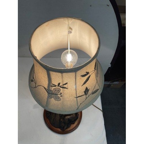 228 - MODERN TABLE LAMP WITH RESIN LADY ASLEEP BY WATER WHEEL ON WOODEN BASE AND BRASS STAND H23