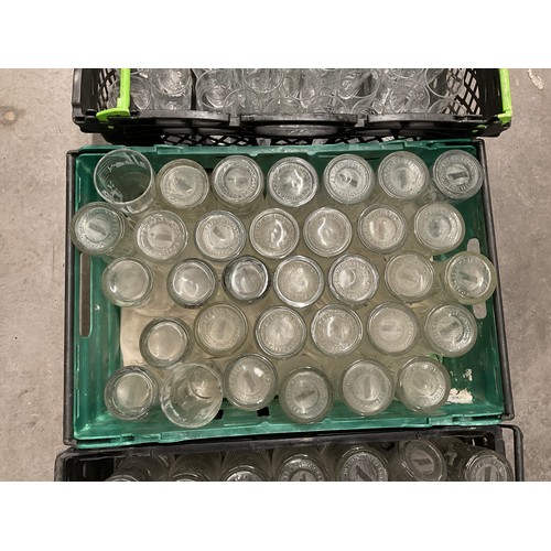 246 - THREE CRATES OF GLASSWARE TO INCLUDE CARLING STELLA ARTOIS CARLSBERG DRINKING GLASSES ETC