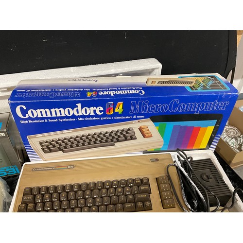 257 - COMMODORE BOXED 64 MICRO COMPUTER ONE B AND UNB0XED COMMODORE DATASSETTE LARGE SELECTION OF GAMES