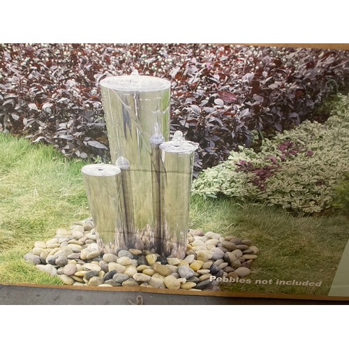 269 - BOXED STAINLESS STEEL TUBE WATER FEATURE