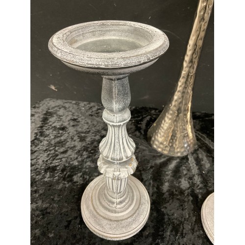 272 - TWO MODERN WHITE METAL CANDLE STANDS ALONG WITH THREE OTHER CANDLE STANDS