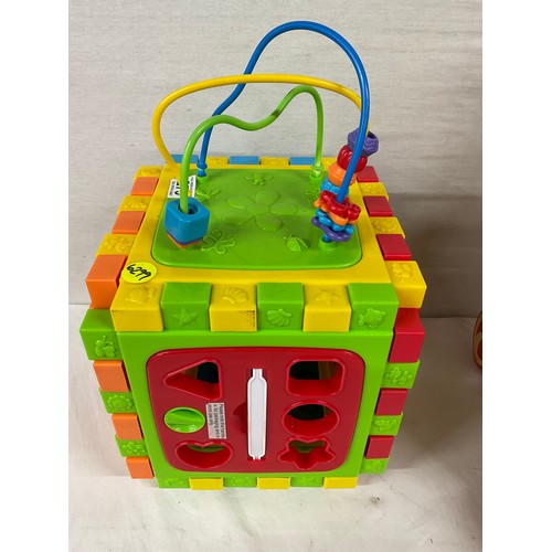 279 - ONE VINTAGE WOODEN WALKER AND ONE OTHER MODERN PLASTIC ACTIVITY CUBE