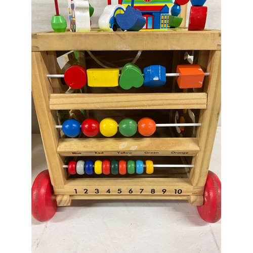 279 - ONE VINTAGE WOODEN WALKER AND ONE OTHER MODERN PLASTIC ACTIVITY CUBE