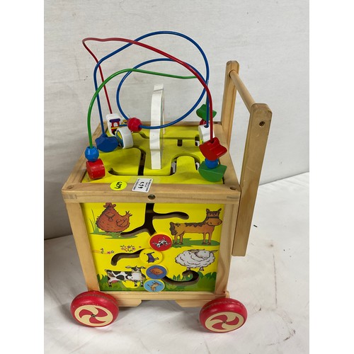 279 - ONE VINTAGE WOODEN WALKER AND ONE OTHER MODERN PLASTIC ACTIVITY CUBE