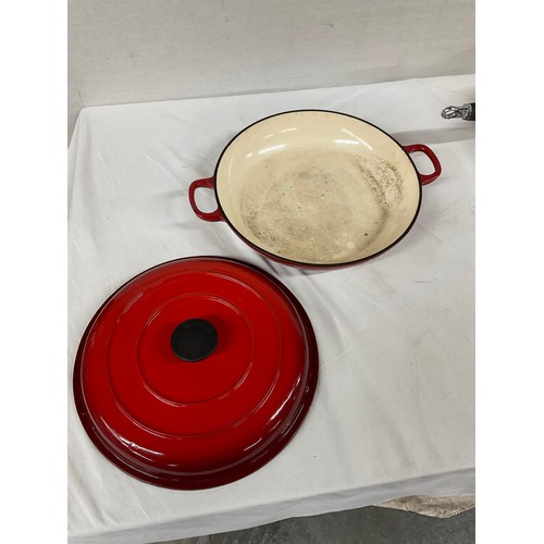 288 - BOX OF CAST IRON COOKWARE TO INCLUDE RED CASSEROLE DISH LE CREUSET SAUCEPAN WITH LID AND TWO OTHER L... 