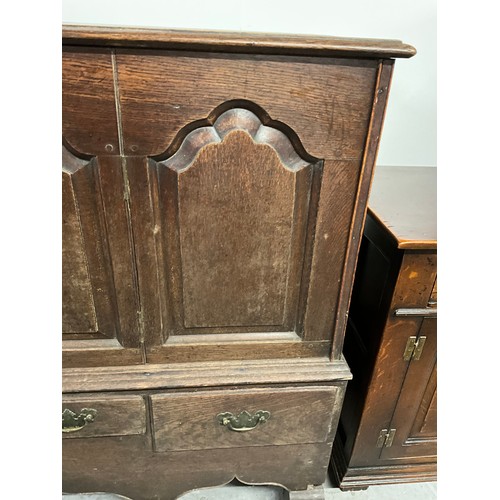 503 - GEORGIAN PANELED OAK TWO DOOR CUPBOARD ON THREE DRAWER BASE W56