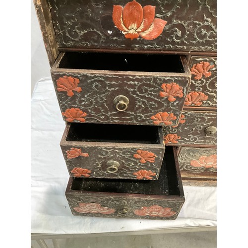 505 - ANTIQUE ORIENTAL TRAVELLING CHEST OF 12 DRAWERS WITH LACQUERED FLORAL DECORATION A/F W32