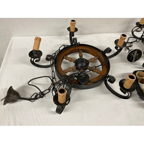 298 - 2 VINTAGE SHIPSWHEEL HANGING LIGHT FITTINGS WITH 5 CANDLE LIGHTS TO INCLUDE SMALL BOX OF SPARE CANDL... 