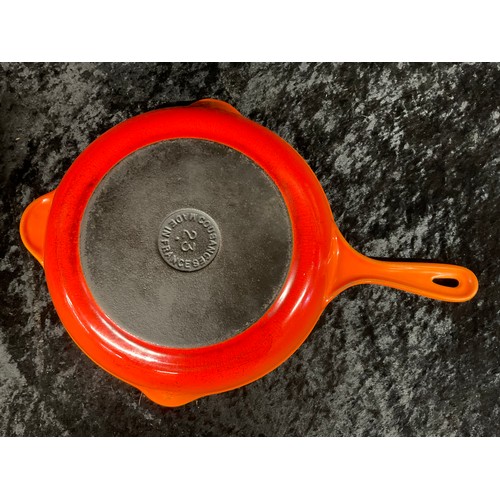 299 - THREE PIECES OF LE CREUSET ONE BEING LARGE WOODEN HANDLE FRYING PAN TWO ROUND SKILLETS AND ONE OTHER... 