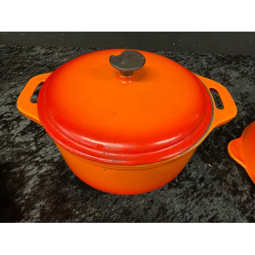 299 - THREE PIECES OF LE CREUSET ONE BEING LARGE WOODEN HANDLE FRYING PAN TWO ROUND SKILLETS AND ONE OTHER... 