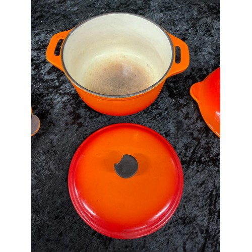 299 - THREE PIECES OF LE CREUSET ONE BEING LARGE WOODEN HANDLE FRYING PAN TWO ROUND SKILLETS AND ONE OTHER... 