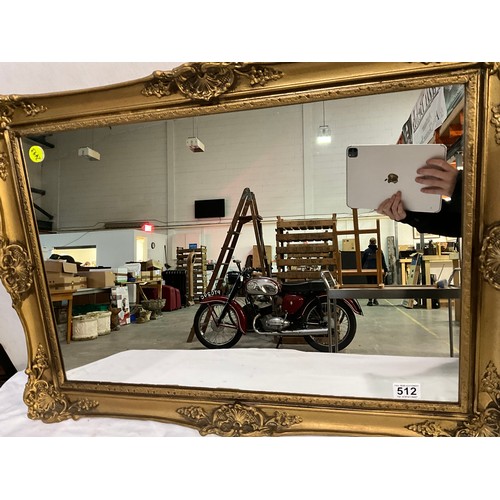 512 - MODERN GILT FRAMED WALL MIRROR 31