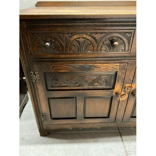 519 - VINTAGE OAK PRIORY STYLE SIDEBOARD WITH 2 DRAWERS OVER 2 DOORS WITH CARVED DECORATION H36