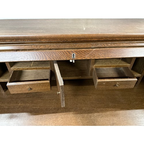 530 - MODERN OAK ROLL TOP DESK WITH CUPBOARDS TO BASE AND MATCHING CHAIR W55