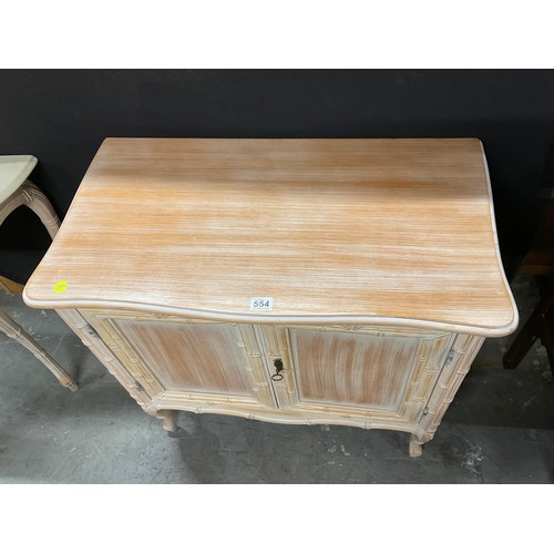 554 - MODERN TWO DOOR SIDE CABINET WITH LIMED EFFECT TO BASE W34