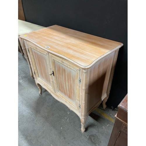 554 - MODERN TWO DOOR SIDE CABINET WITH LIMED EFFECT TO BASE W34