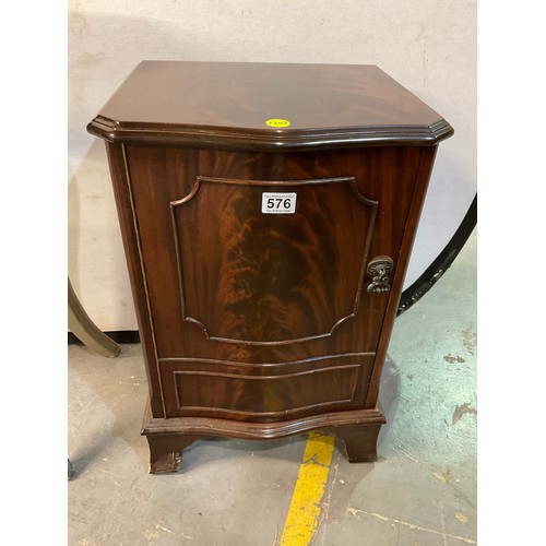 576 - MODERN MAHOGANY BEDSIDE CUPBOARD ON BRACKET FEET W16