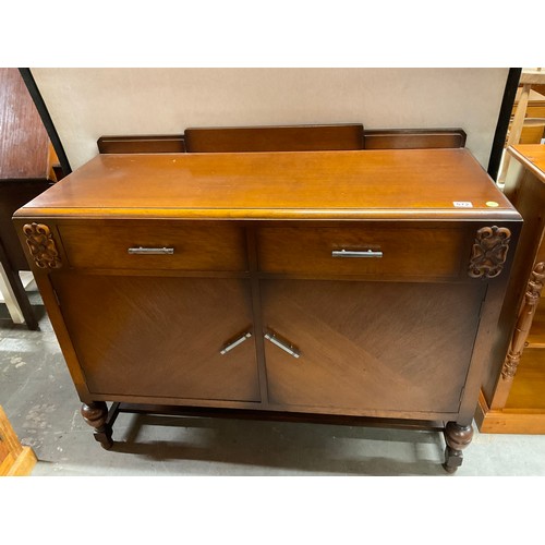 572 - VINTAGE 1950S OAK SIDEBOARD WITH TWO DRAWERS ABOVE TWO CUPBOARDS WITH CHROME HANDLES W48