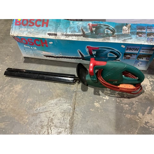 321 - BLACK AND DECKER ELECTRIC LAWN MOWER BLACK AND DECKER CABLE REEL,  BOSCH HEDGETRIMMER