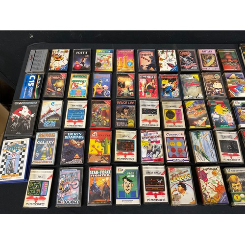 257 - COMMODORE BOXED 64 MICRO COMPUTER ONE B AND UNB0XED COMMODORE DATASSETTE LARGE SELECTION OF GAMES