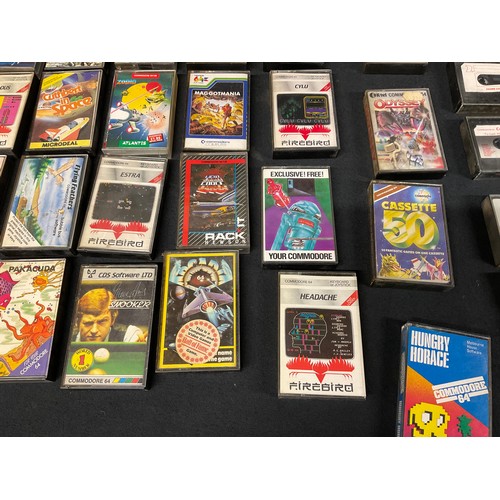 257 - COMMODORE BOXED 64 MICRO COMPUTER ONE B AND UNB0XED COMMODORE DATASSETTE LARGE SELECTION OF GAMES