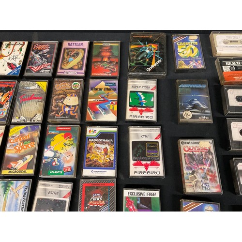 257 - COMMODORE BOXED 64 MICRO COMPUTER ONE B AND UNB0XED COMMODORE DATASSETTE LARGE SELECTION OF GAMES