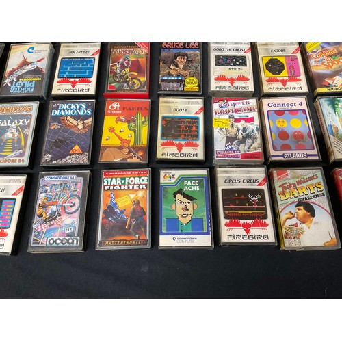 257 - COMMODORE BOXED 64 MICRO COMPUTER ONE B AND UNB0XED COMMODORE DATASSETTE LARGE SELECTION OF GAMES