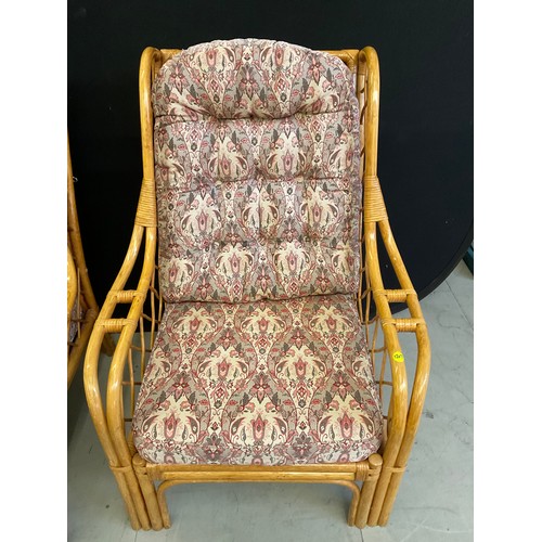 434 - FOUR  CANE UPHOLSTERED CONSERVATORY ARMCHAIRS