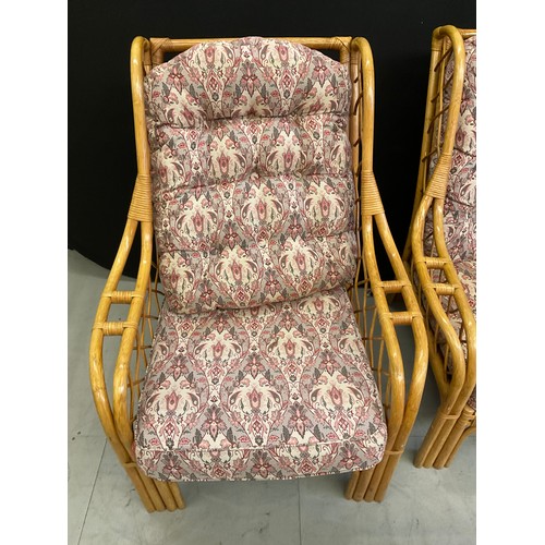 434 - FOUR  CANE UPHOLSTERED CONSERVATORY ARMCHAIRS