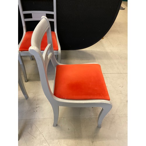 435 - SEVEN GREY PAINTED WOODEN CHAIRS WITH ORANGE UPHOLSTERED SEATS