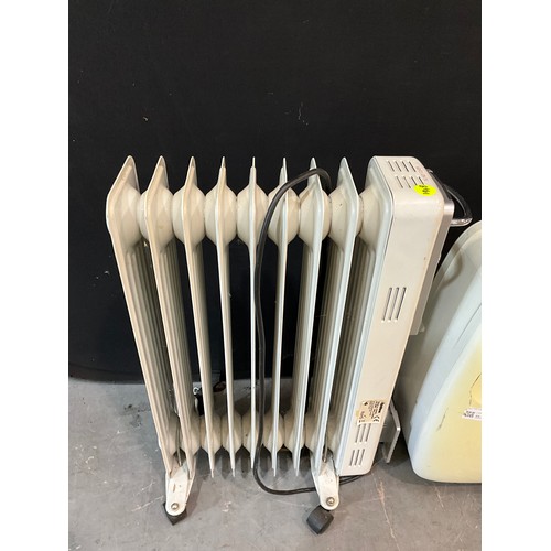 394 - PORTABLE AIR CONDITIONING UNIT AND OIL FILLED RADIATOR