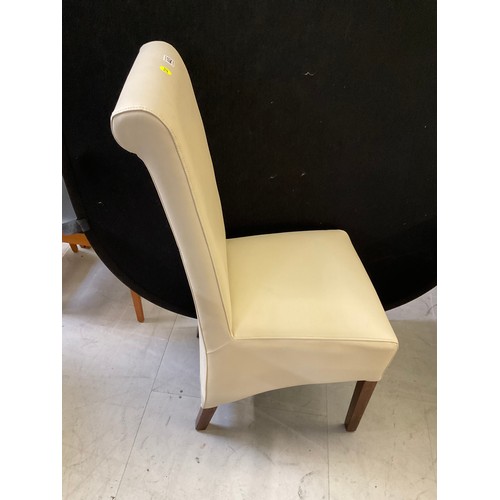 443 - CREAM LEATHER CHAIR AND FOOT STOOL A/F