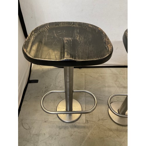 451 - FOUR METAL BAR STOOLS WITH WOODEN SEATS ON CHROME BASES WITH FOOT REST