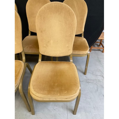 452 - ELEVEN GOLD COLOURED STACKABLE THEATRE/FUNCTION CHAIRS