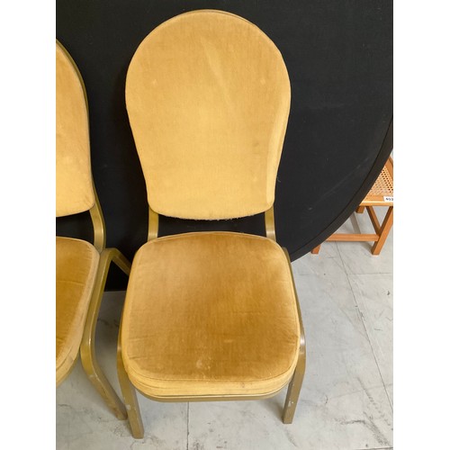 452 - ELEVEN GOLD COLOURED STACKABLE THEATRE/FUNCTION CHAIRS