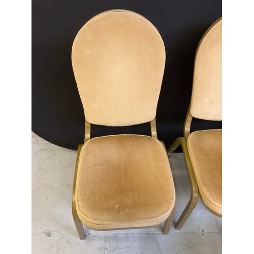 452 - ELEVEN GOLD COLOURED STACKABLE THEATRE/FUNCTION CHAIRS