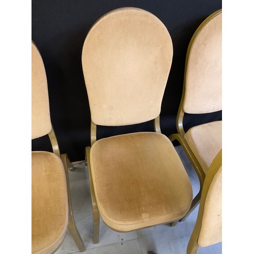 452 - ELEVEN GOLD COLOURED STACKABLE THEATRE/FUNCTION CHAIRS