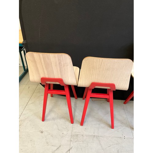 454 - SEVEN  WOODEN CAFE CHAIRS WITH RED PAINTED LEGS