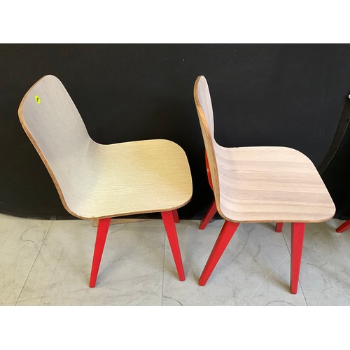 454 - SEVEN  WOODEN CAFE CHAIRS WITH RED PAINTED LEGS